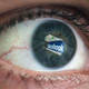 In this photo illustration the Social networking site Facebook is reflected in the eye of a man on March 25, 2009 in London, England.